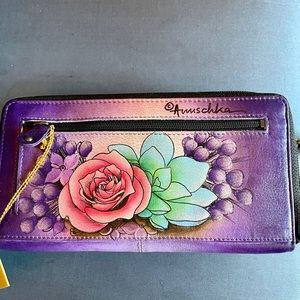 Anuschka hand-painted purple floral wristlet. It holds a large iphone 12 pro max
